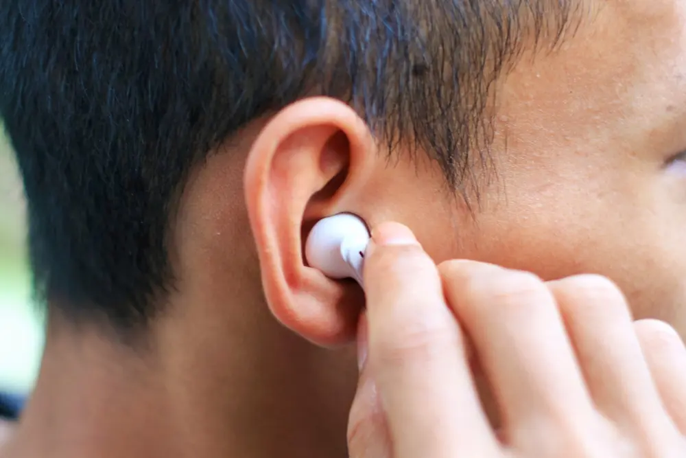 Person wearing earbuds